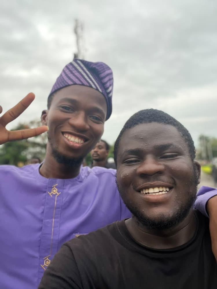 Two brothers smiling together in a selfie