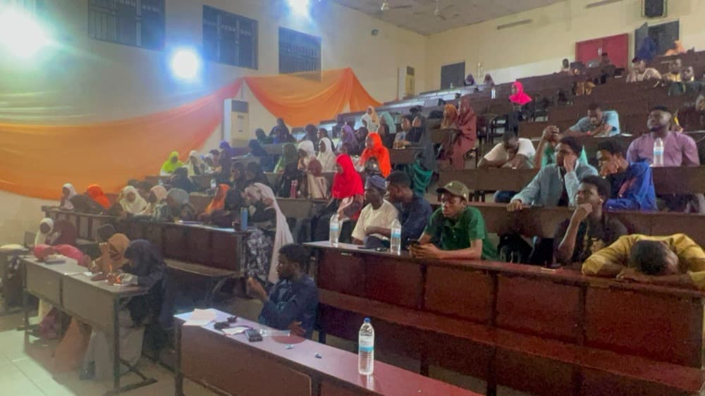 Students filling a lecture theatre for the MUSSA Symposium