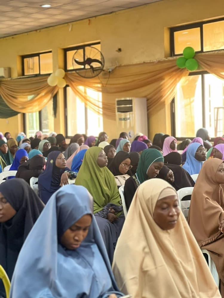 Sisters seated in the Islamic Centre Hall for the Sisters' Seminar